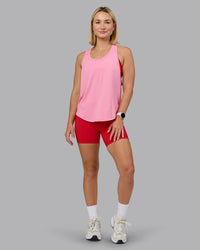 Woman wearing AeroFLX+ Drop Armhole Seamless Tank - Candy Pink | Model:Halle | Size:S