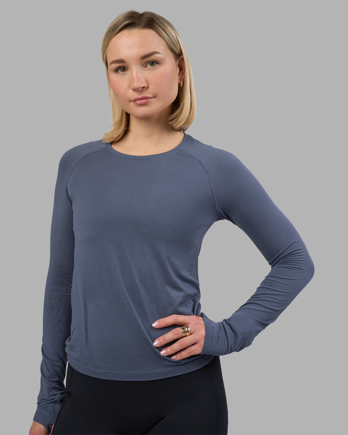 Woman wearing AeroFLX+ Seamless Long Sleeve Tee - Night Shadow/Night Shadow | Model:Halle | Size:S