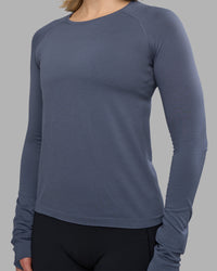Woman wearing AeroFLX+ Seamless Long Sleeve Tee - Night Shadow/Night Shadow | Model:Halle | Size:S