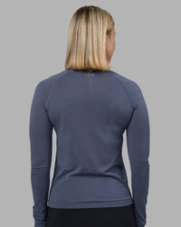 Woman wearing AeroFLX+ Seamless Long Sleeve Tee - Night Shadow/Night Shadow | Model:Halle | Size:S
