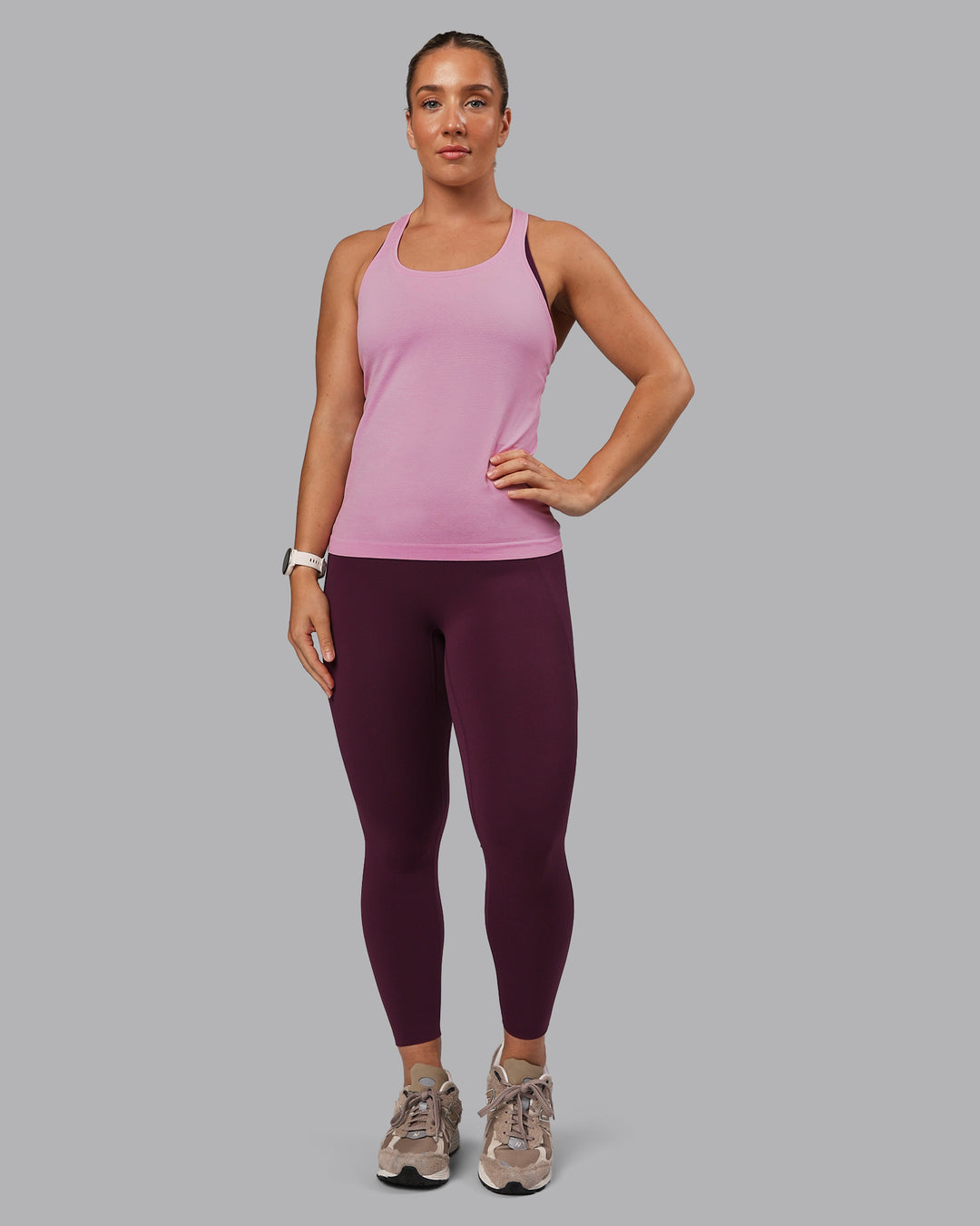 Woman wearing AeroFLX+ Seamless Tank - Bubblegum/Pirouette
