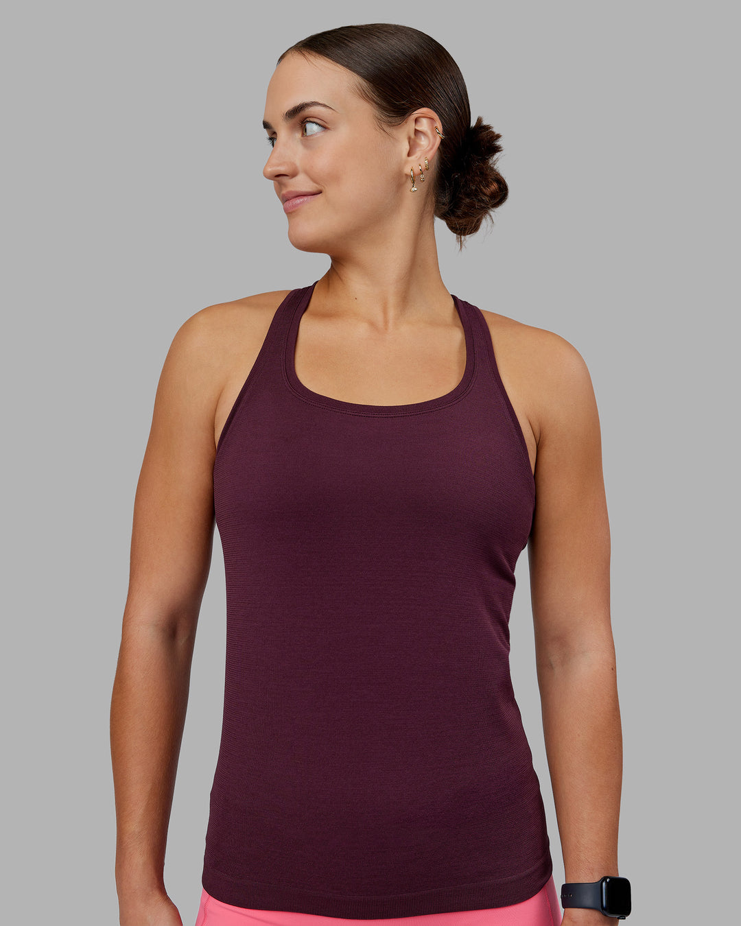 Woman wearing AeroFLX+ Seamless Tank - Cherry Lacquer/Cherry Lacquer | Model:Keisha | Size:S