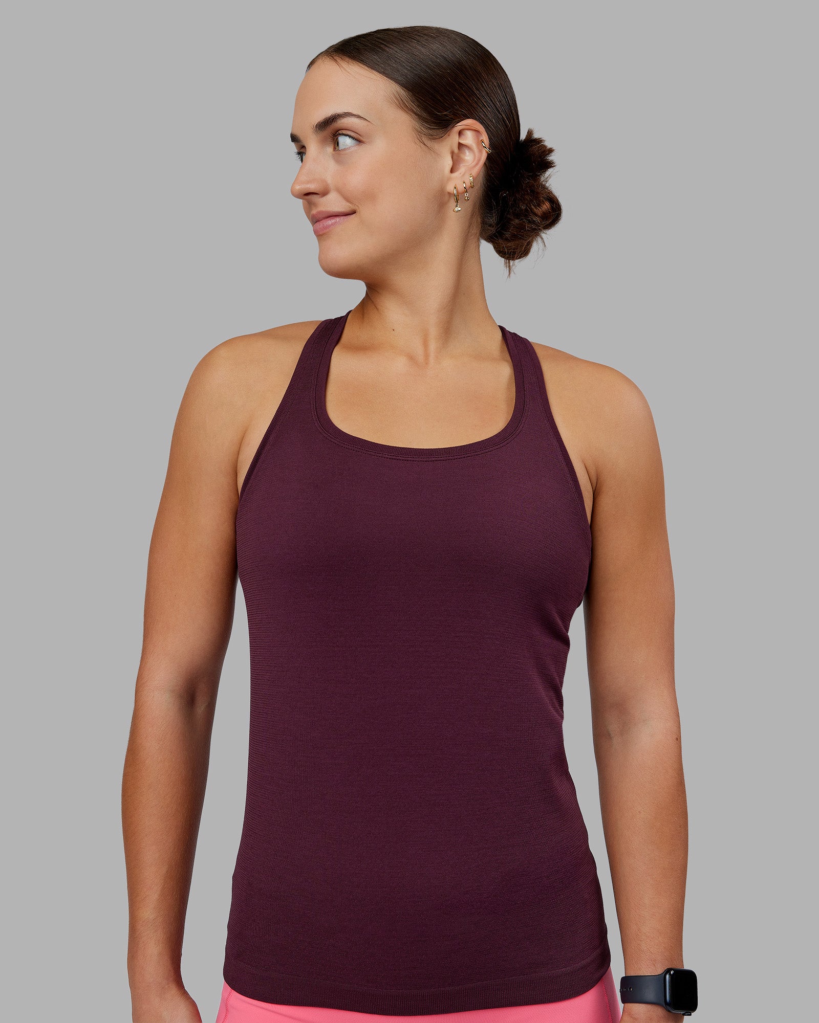 Woman wearing AeroFLX+ Seamless Tank - Cherry Lacquer/Cherry Lacquer | Model:Keisha | Size:S