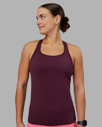 Woman wearing AeroFLX+ Seamless Tank - Cherry Lacquer/Cherry Lacquer | Model:Keisha | Size:S