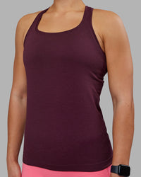 Woman wearing AeroFLX+ Seamless Tank - Cherry Lacquer/Cherry Lacquer | Model:Keisha | Size:S
