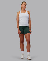 Woman wearing AeroFLX+ Seamless Tank - White | Thumbnail Index: 5