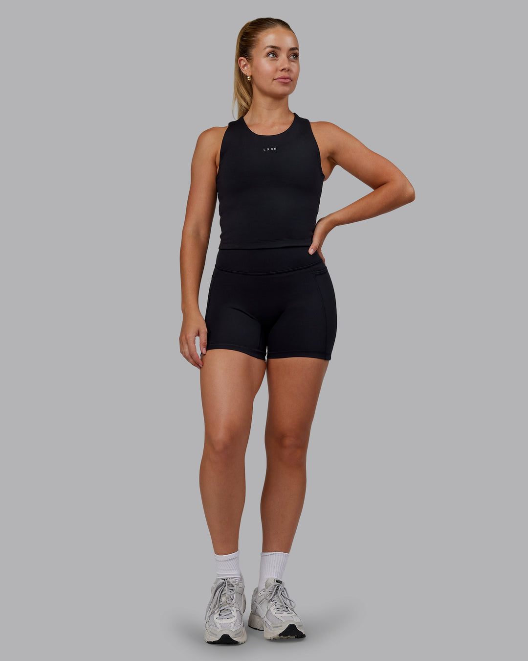 Woman wearing Base Tank - Black | Size:S | Model:Hannah