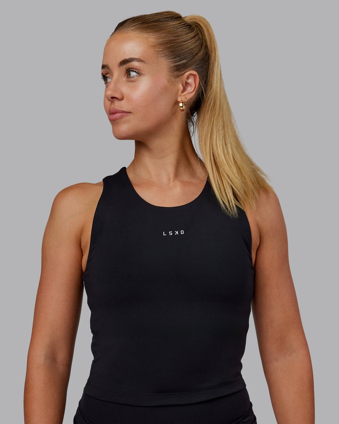 Woman wearing Base Tank - Black | Size:S | Model:Hannah