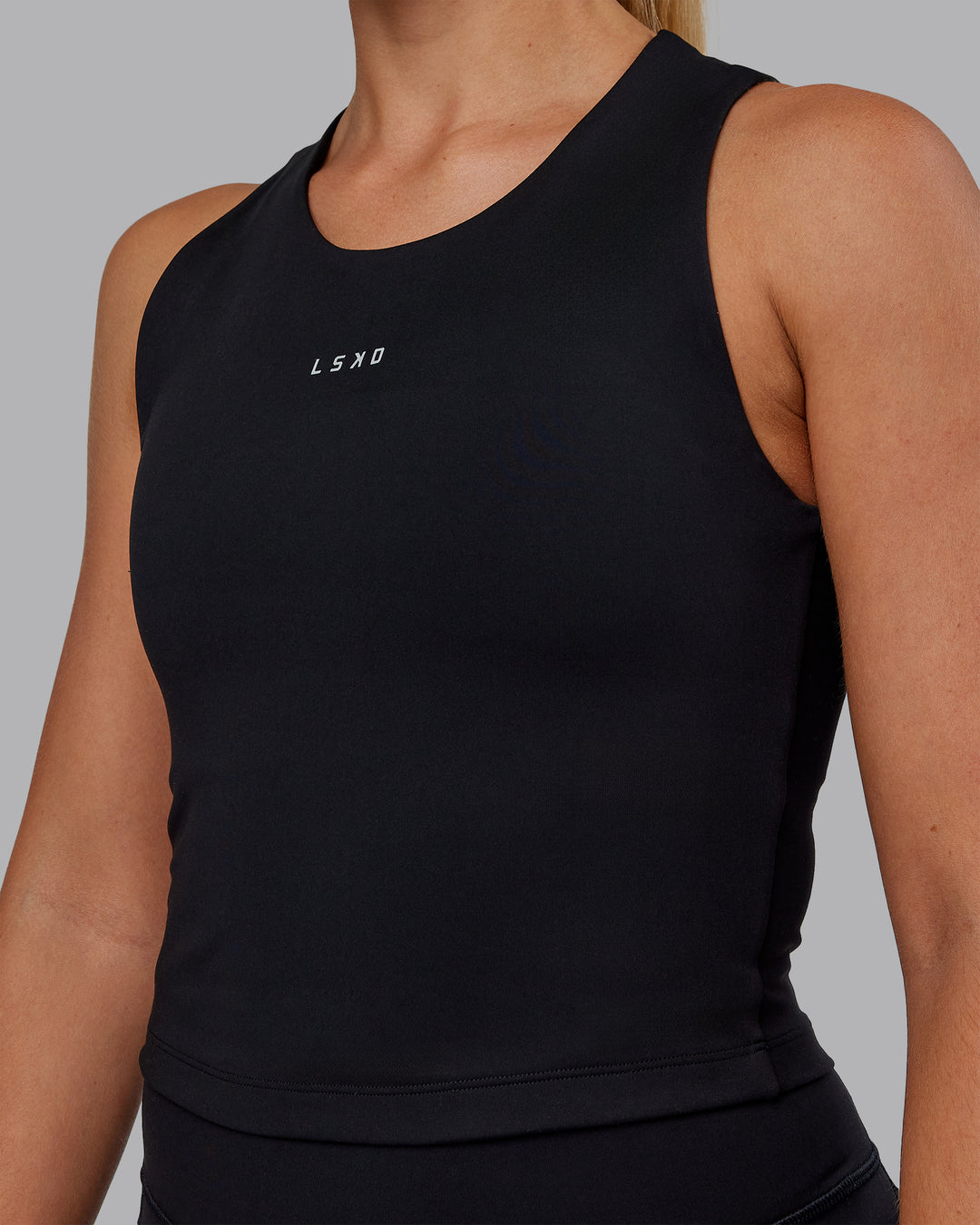 Woman wearing Base Tank - Black | Size:S | Model:Hannah