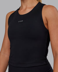 Woman wearing Base Tank - Black | Size:S | Model:Hannah