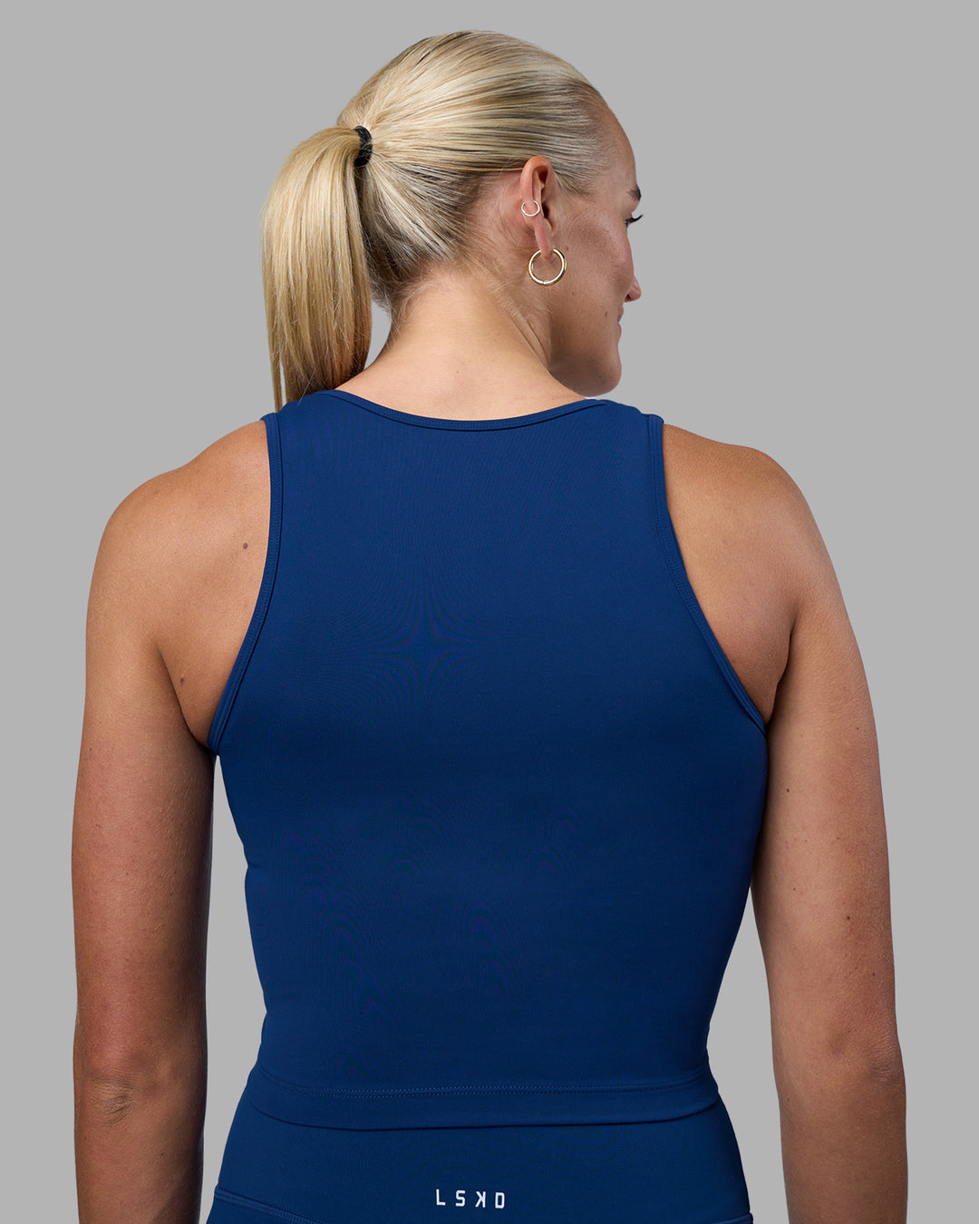 Woman wearing Base Tank - Midnight Blue | Model:Katie | Size:S