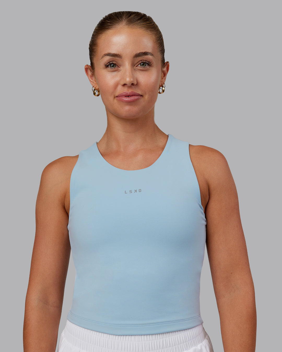 Woman wearing Base Tank - Skyride | Model:Hannah | Size:S