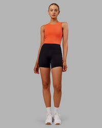 Woman wearing Base Tank - Ultra Orange | Model:Ella | Size:S
