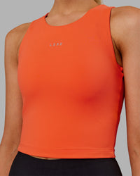 Woman wearing Base Tank - Ultra Orange | Model:Ella | Size:S
