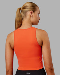 Woman wearing Base Tank - Ultra Orange | Model:Ella | Size:S