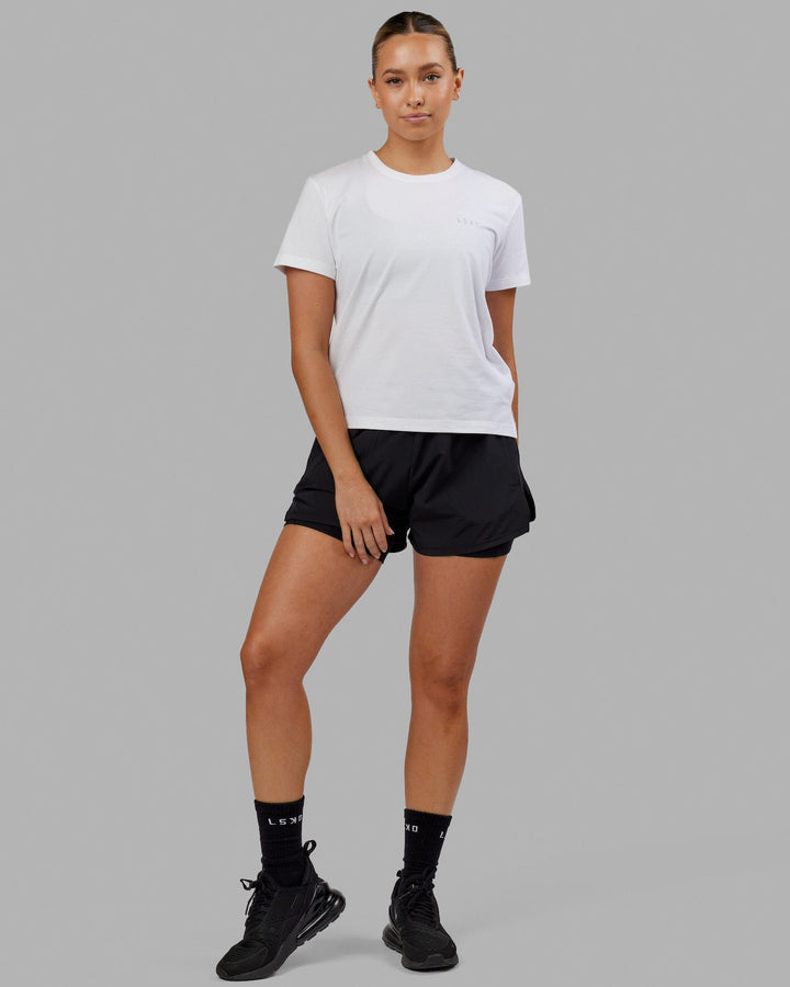 Woman wearing Deluxe PimaFLX Tee - White
