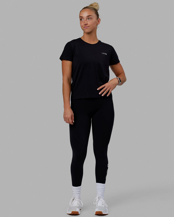 Woman wearing Endeavour FLX Cotton Tee - Black-White