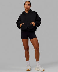 Woman wearing Love The Run Hoodie - Black
