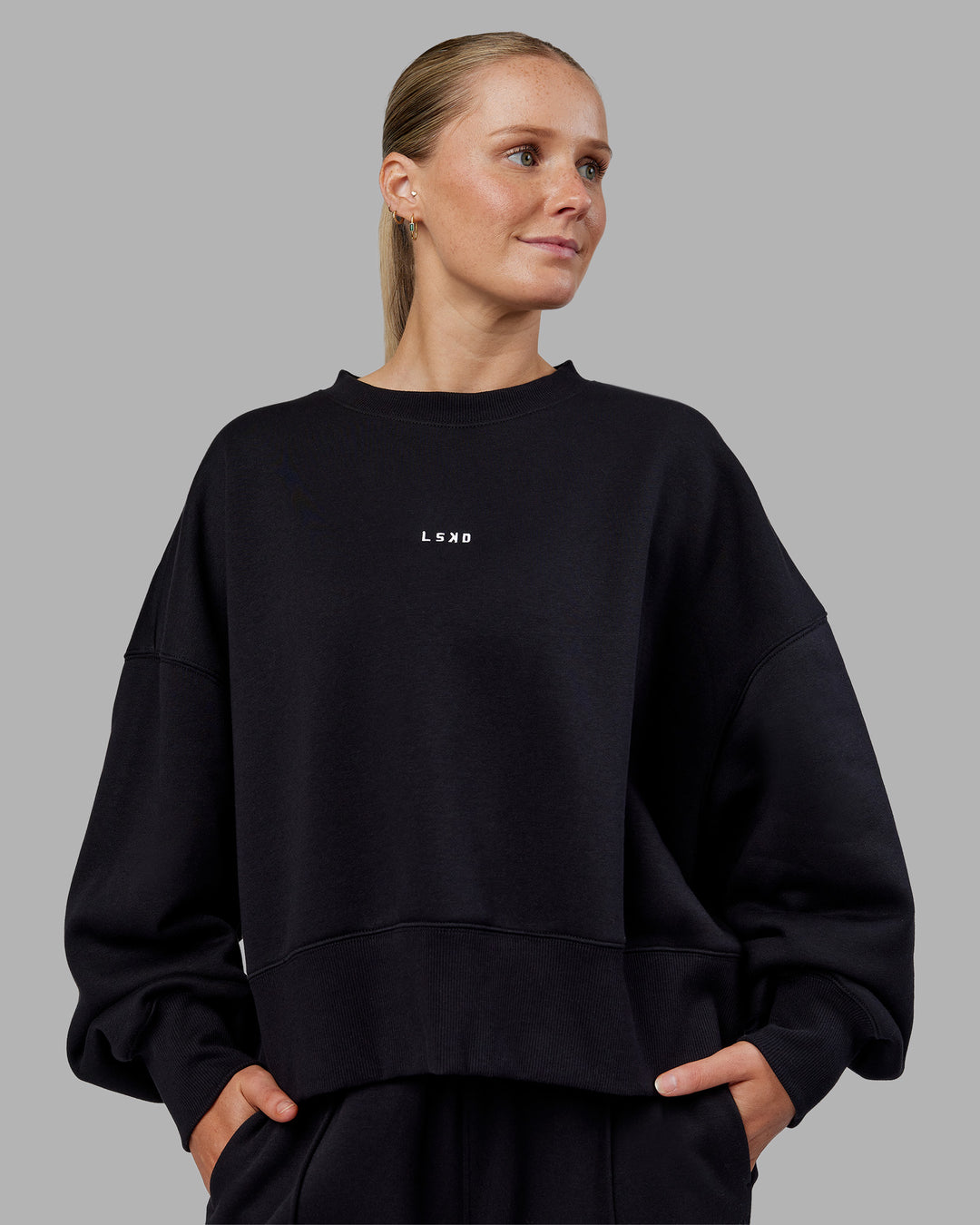 Woman wearing MVP Oversized Sweater - Black-White | Model:Neve | Size:S
