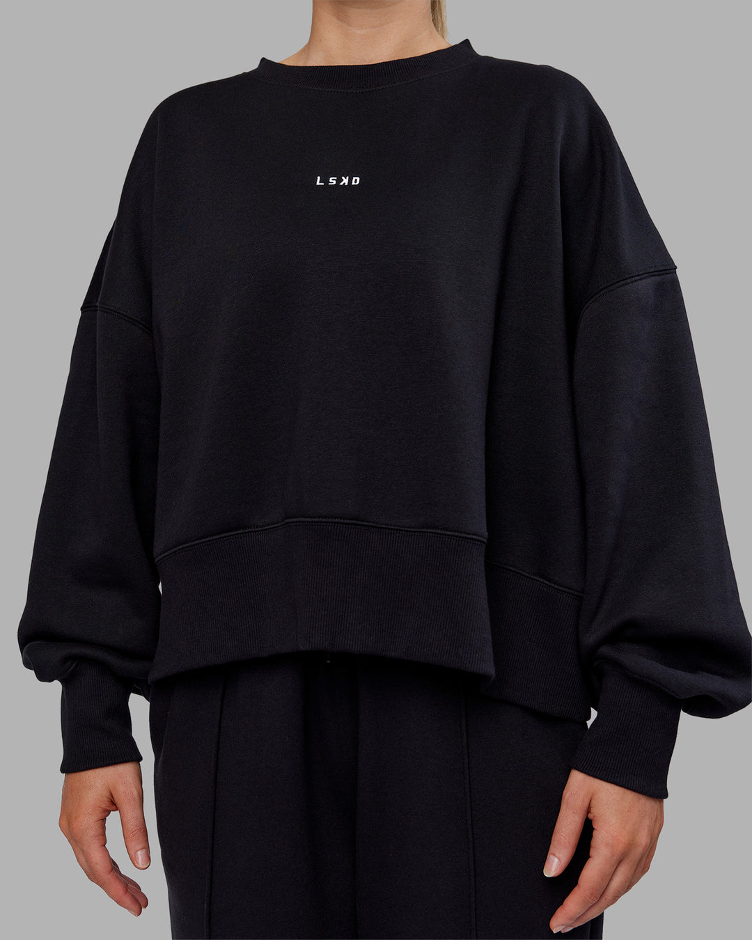 Woman wearing MVP Oversized Sweater - Black-White | Model:Neve | Size:S