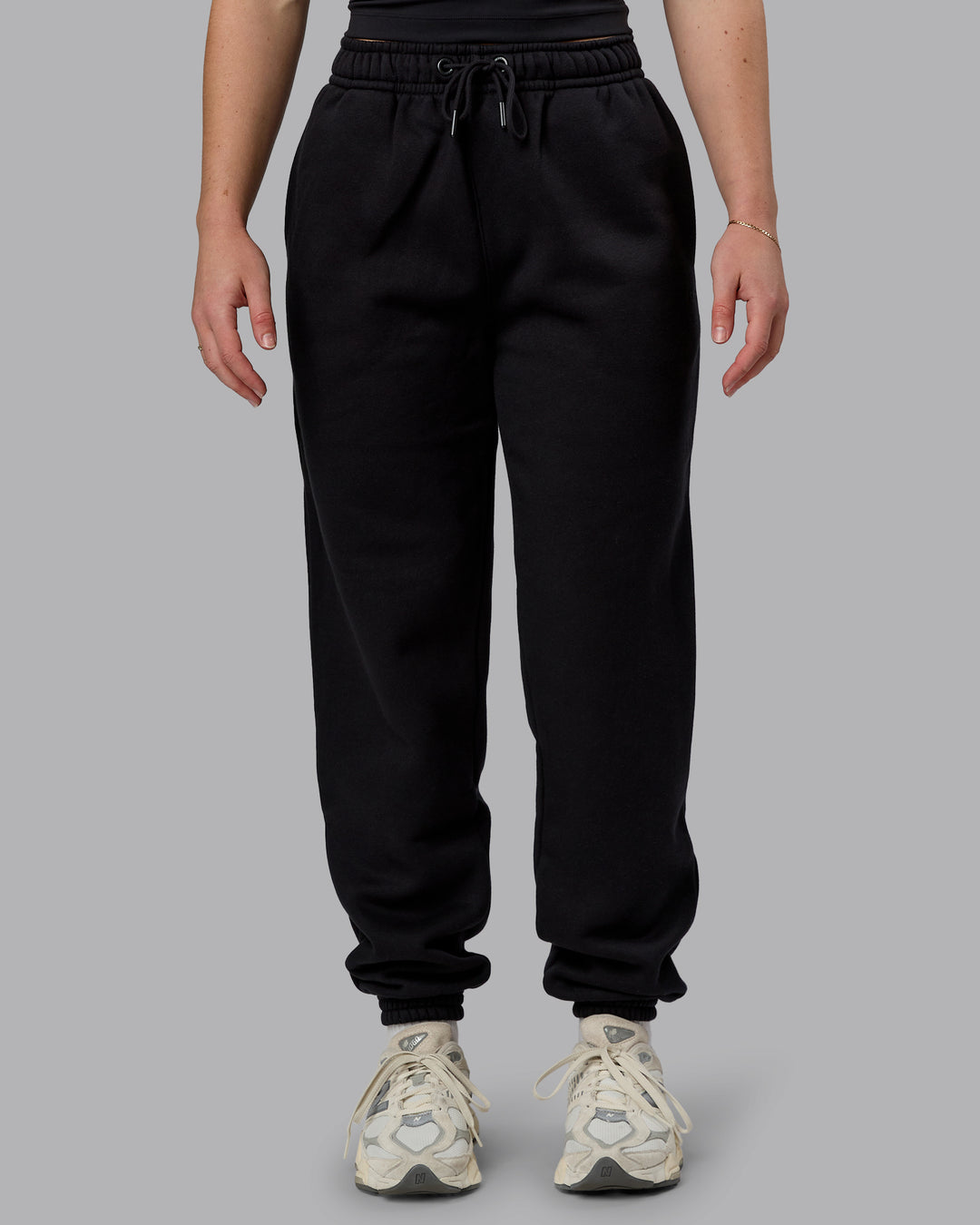 Woman wearing MVP Track Pant - Black | Model:Sav | Size:S