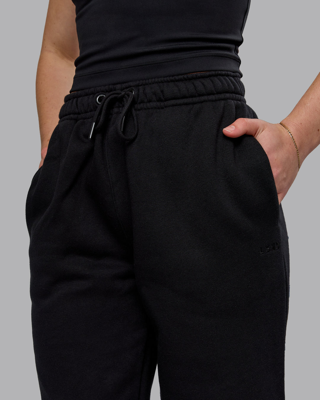 Woman wearing MVP Track Pant - Black | Model:Sav | Size:S