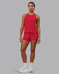 Woman wearing Pace Running Tank - Scarlet