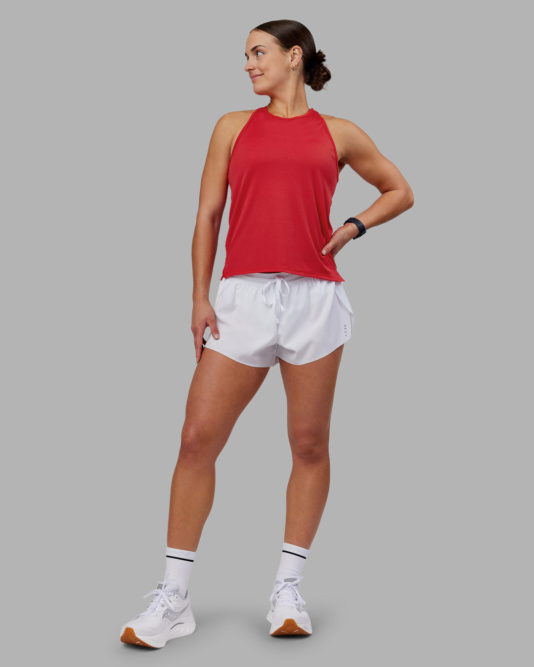 Woman wearing Pace Running Tank 2.0 - Scarlet | Model:Keisha | Size:S