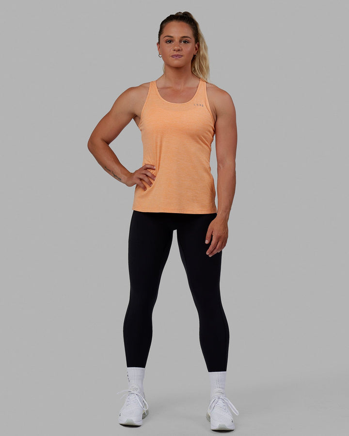Woman wearing Perform VapourFLX Tank - Tangerine Marl