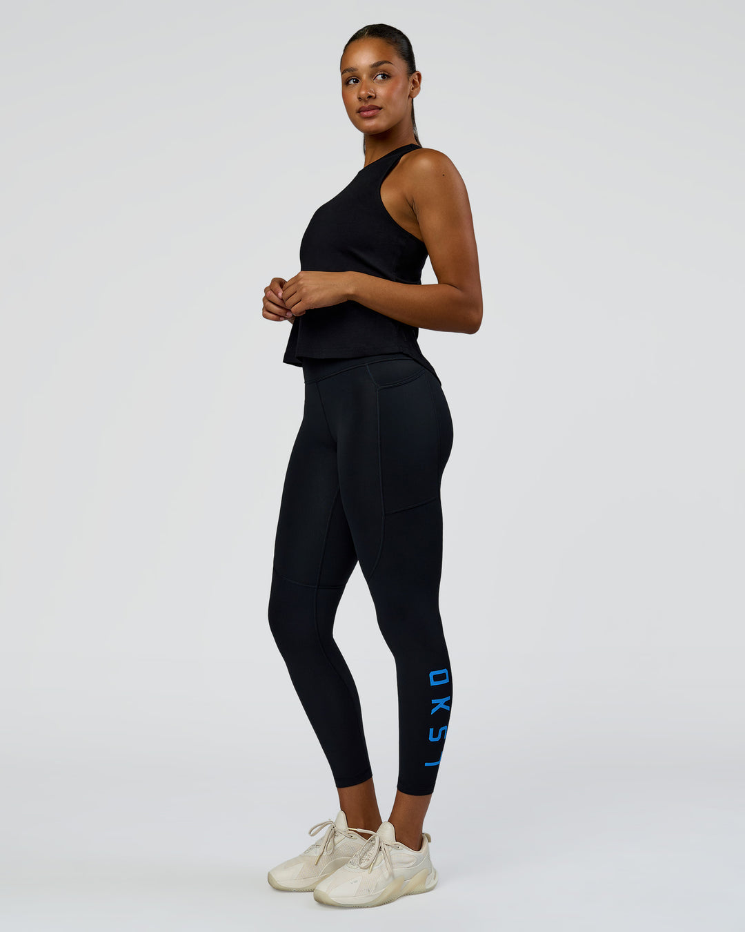 Woman wearing Wrap It Up FLXCotton Tank - Black | Model:Rosie | Size:S