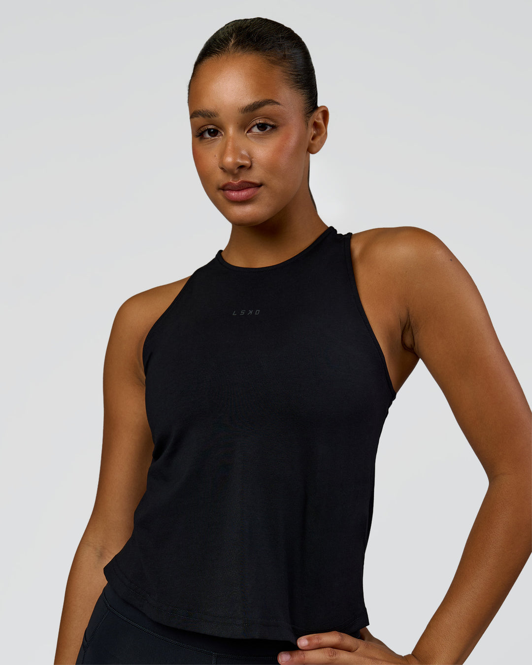Woman wearing Wrap It Up FLXCotton Tank - Black | Model:Rosie | Size:S
