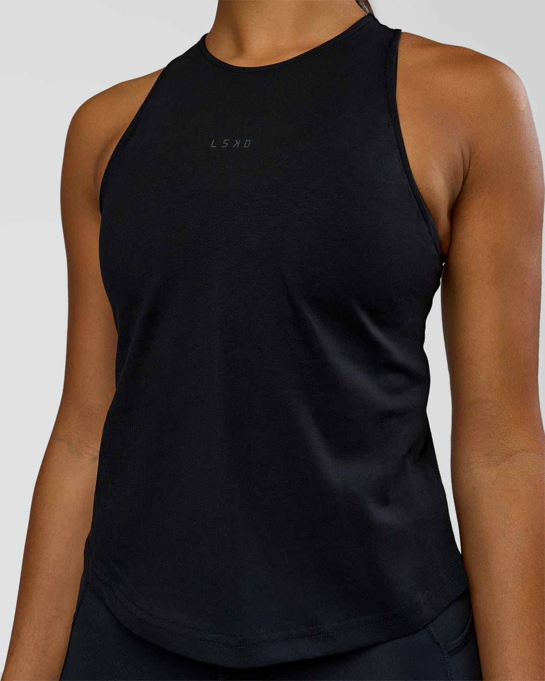 Woman wearing Wrap It Up FLXCotton Tank - Black | Model:Rosie | Size:S