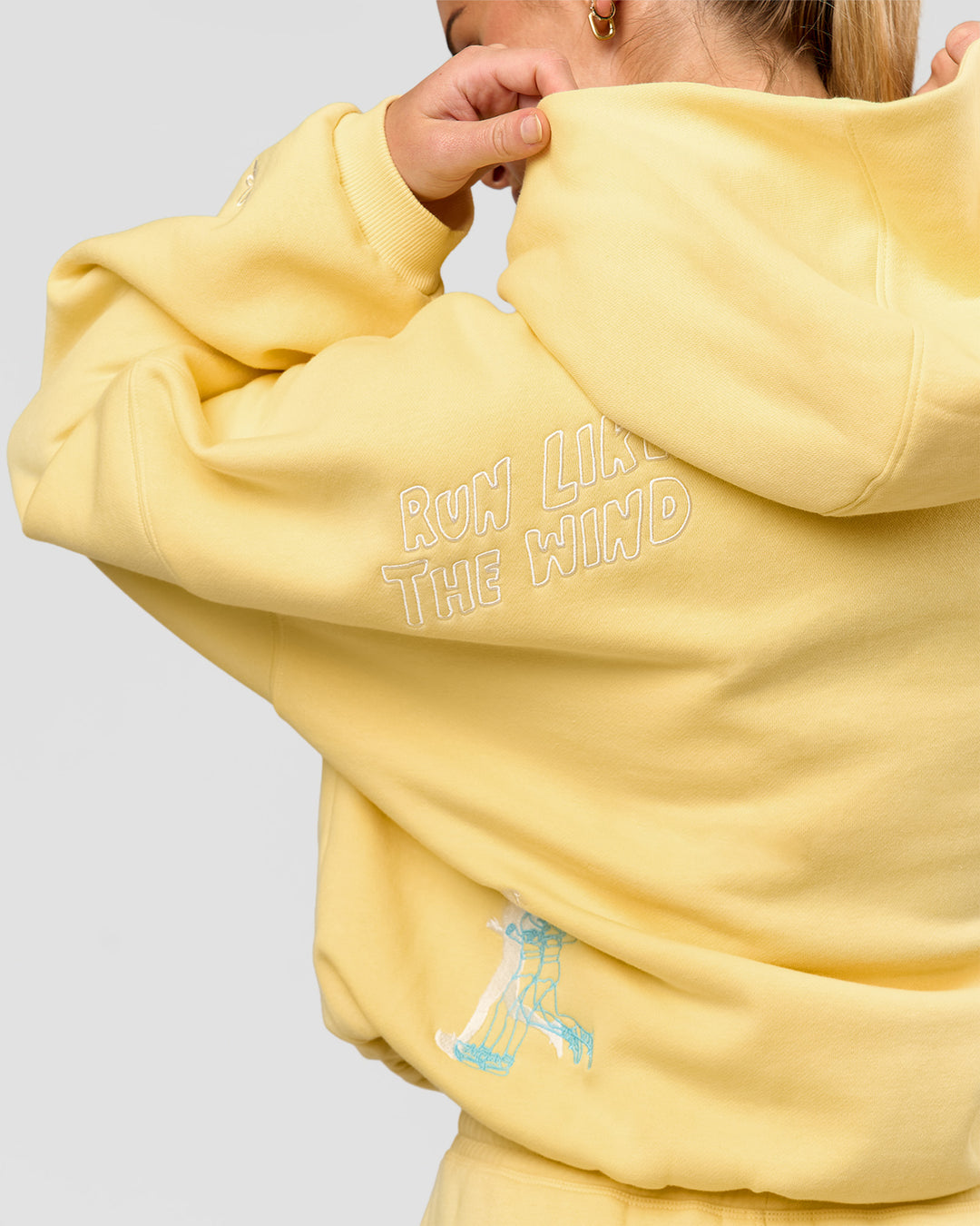 Woman wearing Zola Oversized Hoodie - Lemon | Model:Issy | Size:S
