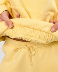 Woman wearing Zola Oversized Hoodie - Lemon | Model:Issy | Size:S