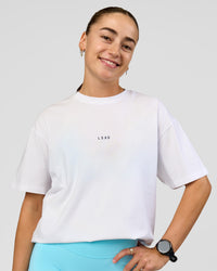 Woman wearing Run Like The Wind FLXCotton Oversized Tee - White-Future Navy | Model:Grace | Size:S