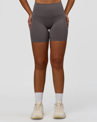 Woman wearing Bend High-Rise 6" Short - Duskstone | Model:Sophie | Size:S
