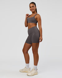 Woman wearing Inertia Sports Bra - Duskstone | Model:Rosie | Size:S