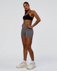 Woman wearing Infinite Contour Sports Bra - Black | Model:Rosie | Size:S
