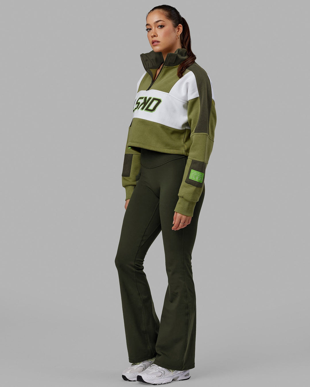 Woman wearing Slam 1/4 Zip Sweater - Moss Stone-Multi