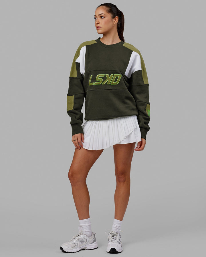 Woman wearing Unisex Slam Sweater Oversize - Forest Night-Moss Stone