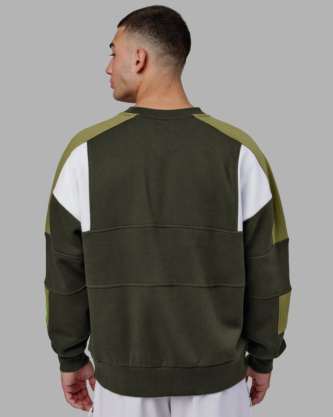 Man wearing Unisex Slam Sweater Oversize - Forest Night-Moss Stone