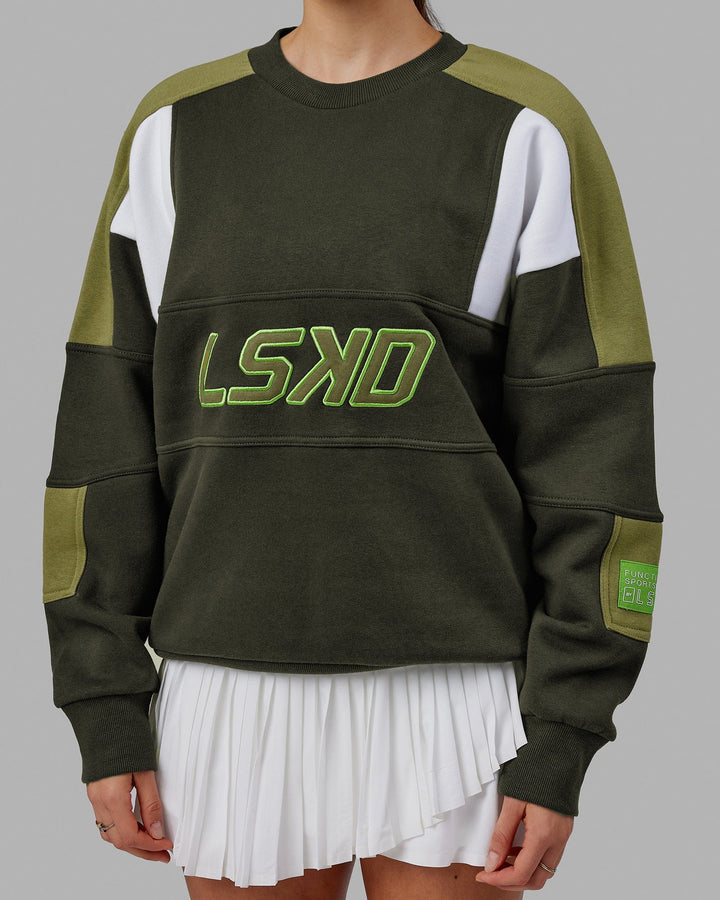 Woman wearing Unisex Slam Sweater Oversize - Forest Night-Moss Stone
