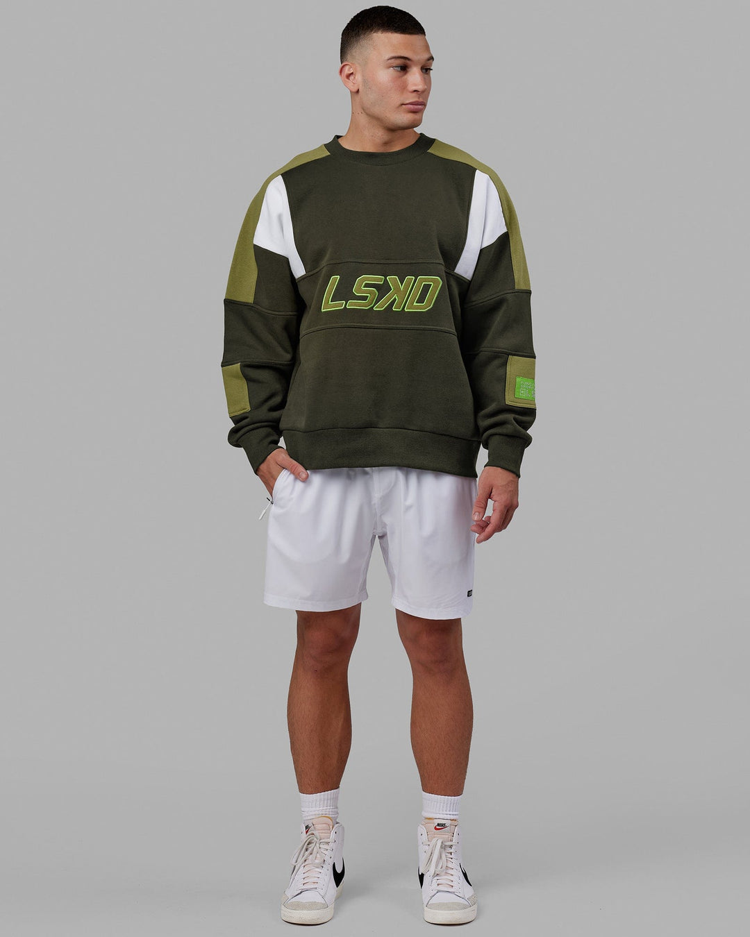 Man wearing Unisex Slam Sweater Oversize - Forest Night-Moss Stone