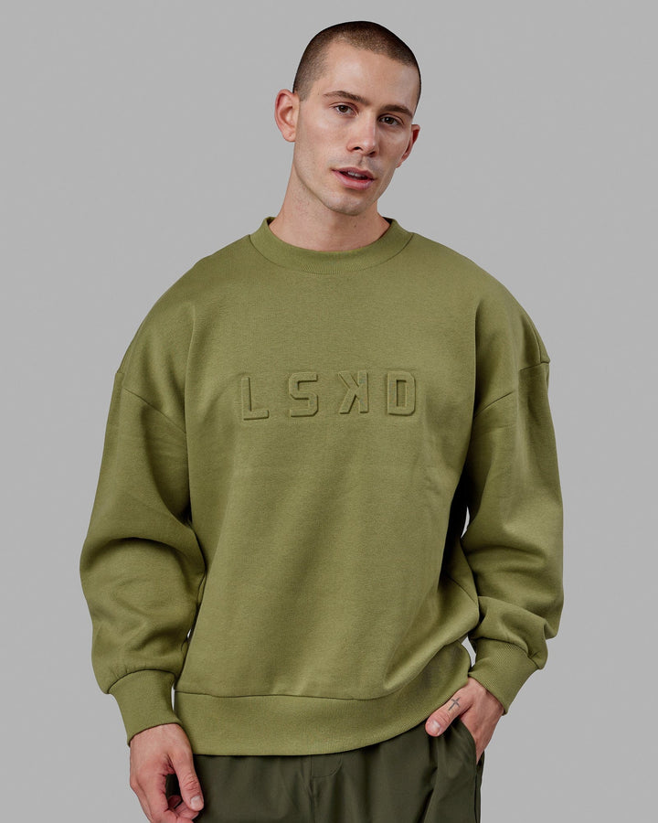 Man wearing Unisex Stamped Sweater Oversize - Moss Stone