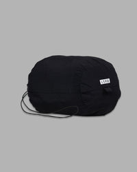 Thrive Packable Jacket - Black in pack