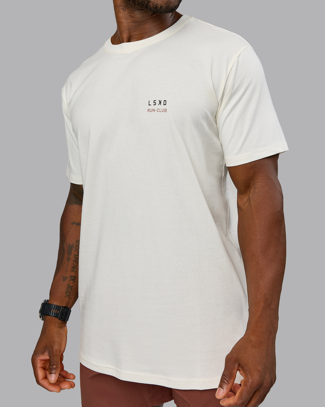 Man wearing Track FLXCotton Tee - Off White-Mahogany | Model:Sam | Size:L