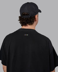 Man wearing Train Cap - Black-White