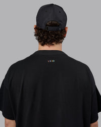 Man wearing Train Cap - Black-White