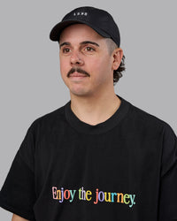 Man wearing Train Cap - Black-White