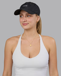 Woman wearing Train Cap - Black-White